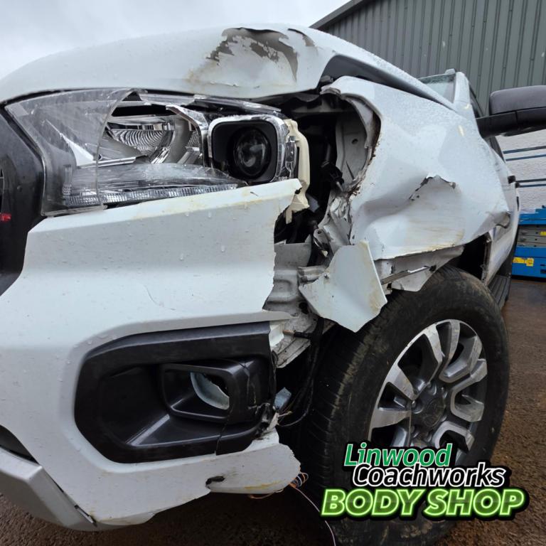 Damaged front bumper and wing on a Ford Ranger before repair at Linwood Coachworks Paisley
